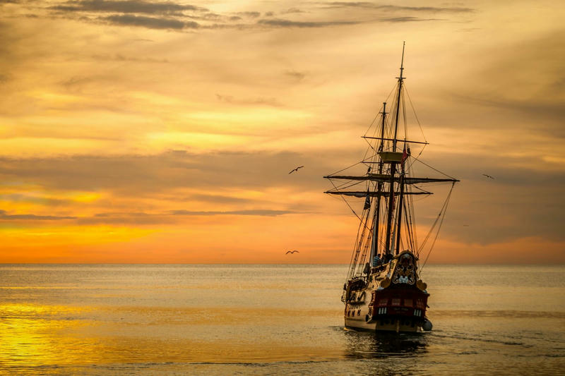 A sailing vessel adrift at sea